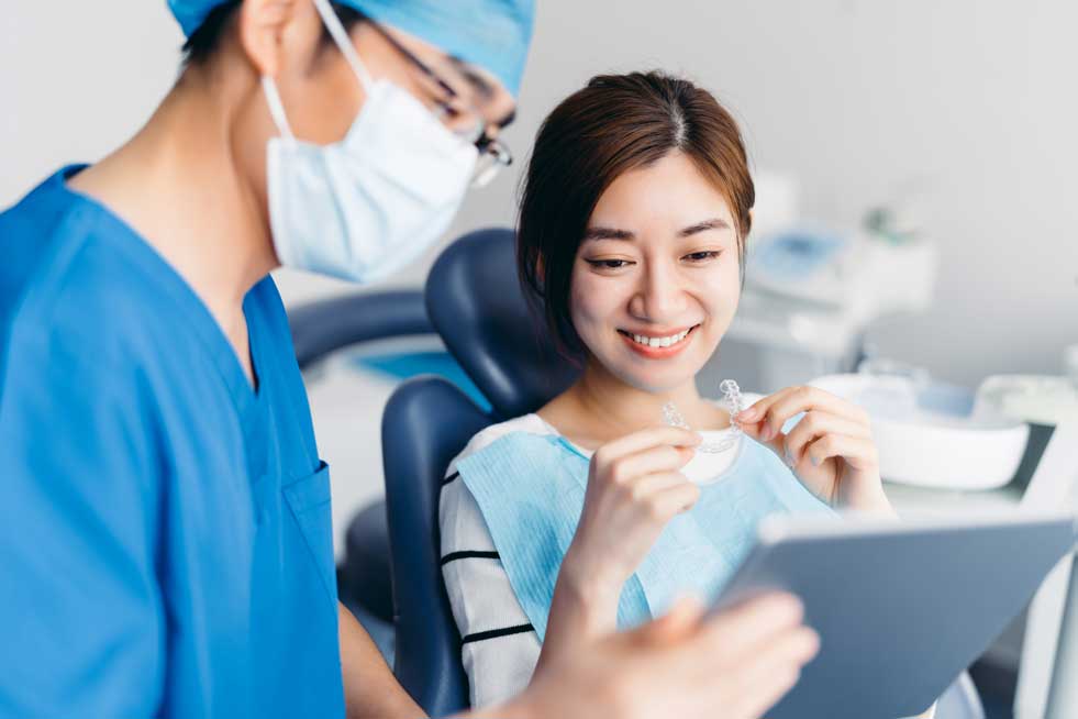 woman trying invisalign braces