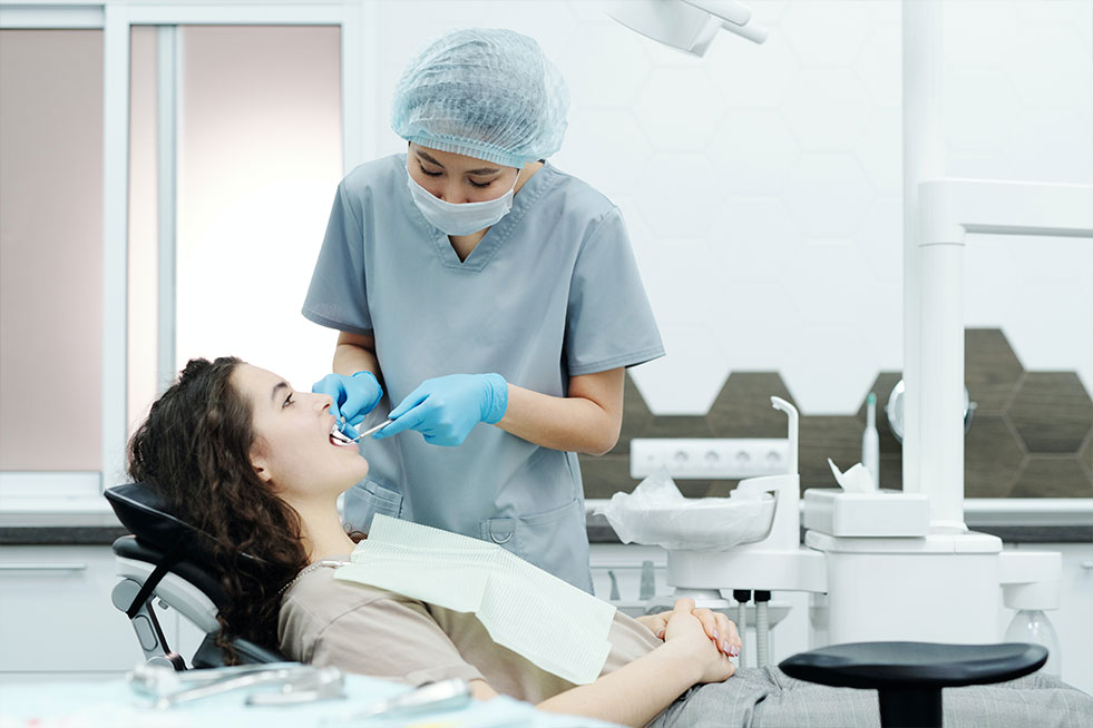patient is getting treatment by dentist