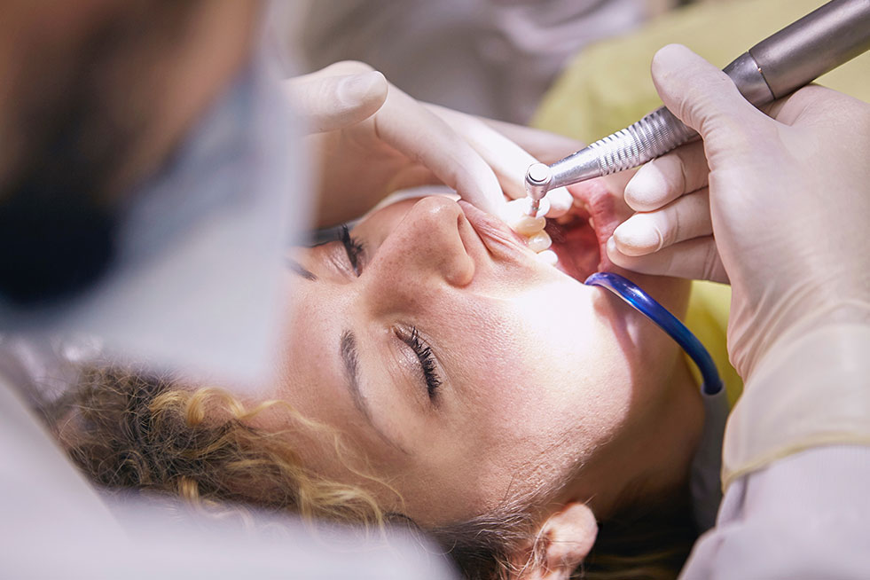 dentist examine the patient's teeth