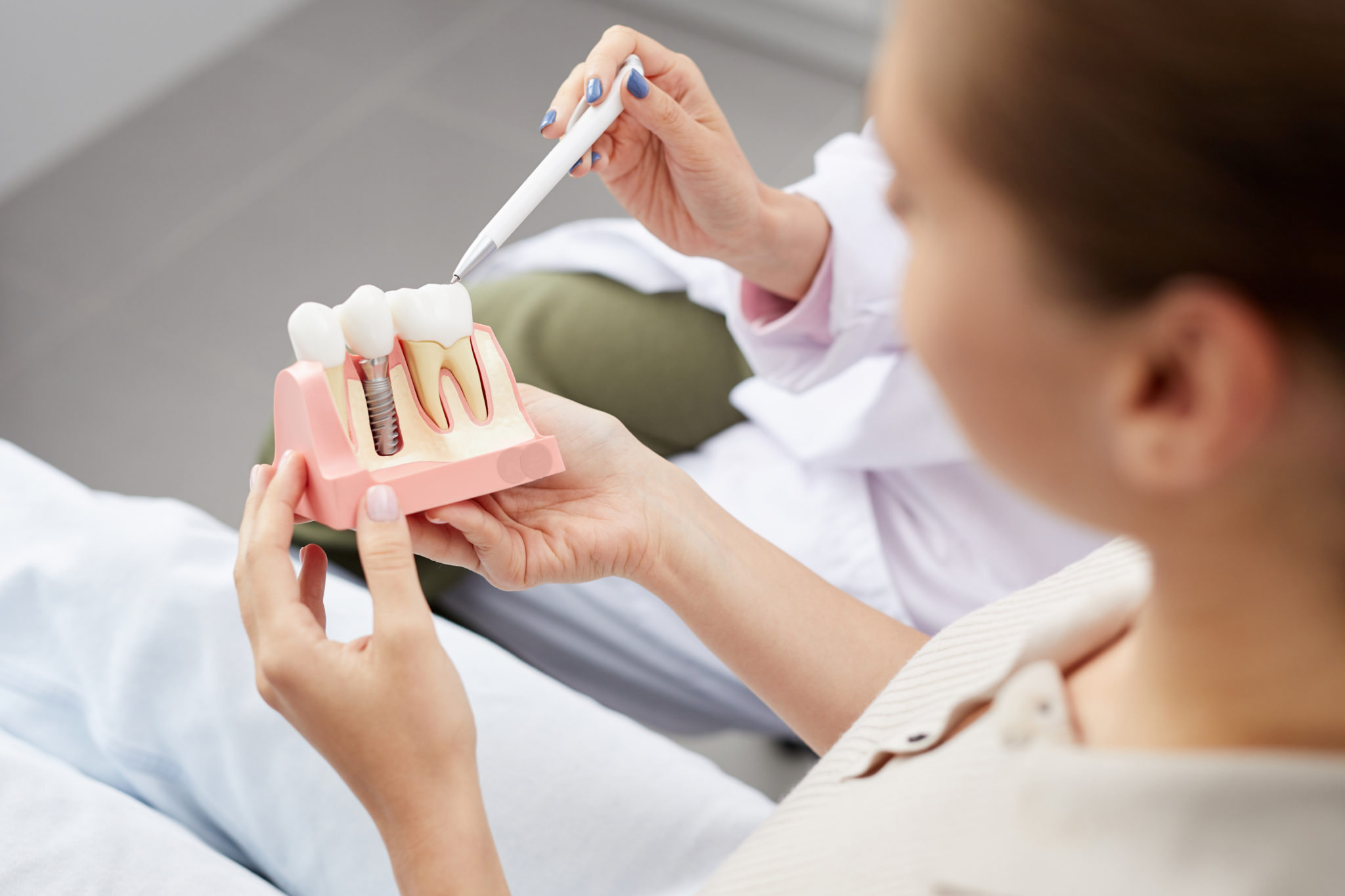 Woman looking at dental implant options